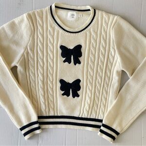 Luna Ivy Ivory Cable Knit Sweater with Black Bow Accents